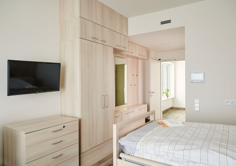 Ein Zimmer im Stadtheim.